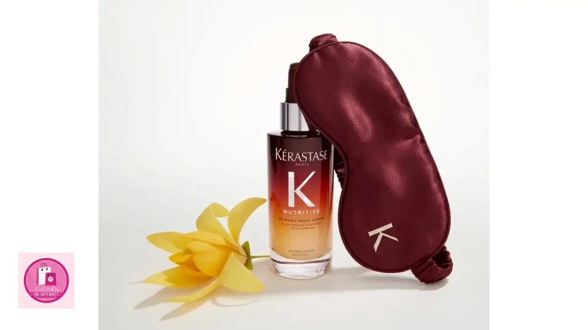 Frasco do Sérum Capilar Noturno Kérastase Nutritive 8H Magic Night ao lado de acessórios de seda.